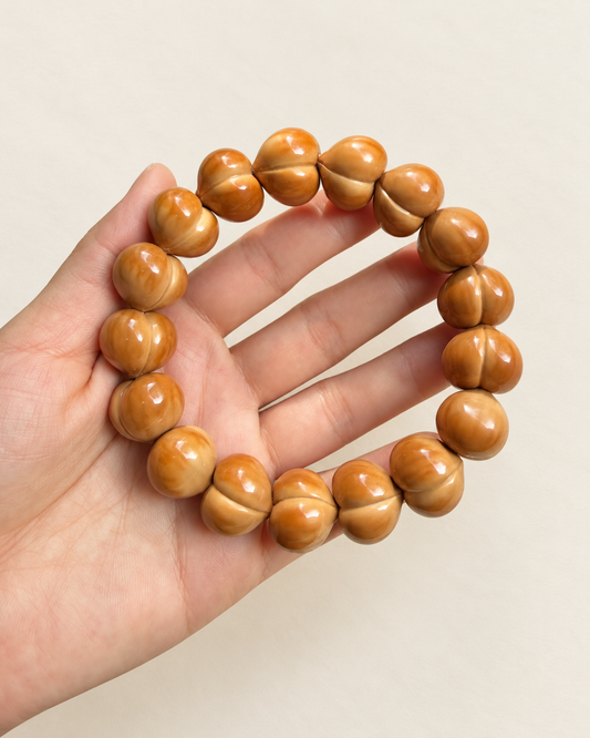 Monkey Head Walnut Bracelet, Glossy Peach Beads — another angle