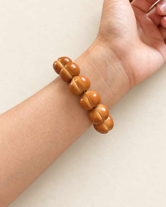 Monkey Head Walnut Hand Strand, Squat Peach Beads — another angle