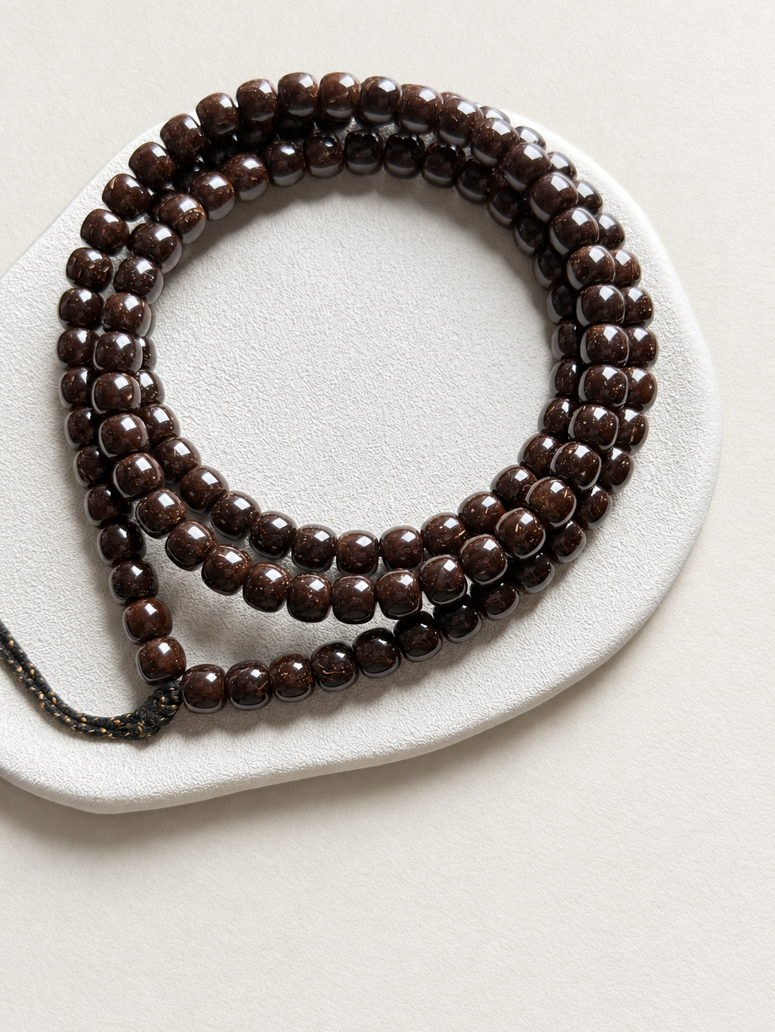 Coconut Calyx Strand, 108 Barrel Beads — another angle