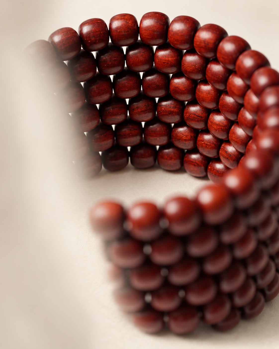 Close view of the grain and polished surface of zitan beads