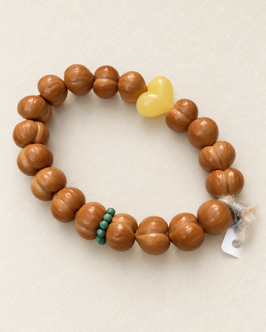 Walnut Bead Strand, Peach Forms