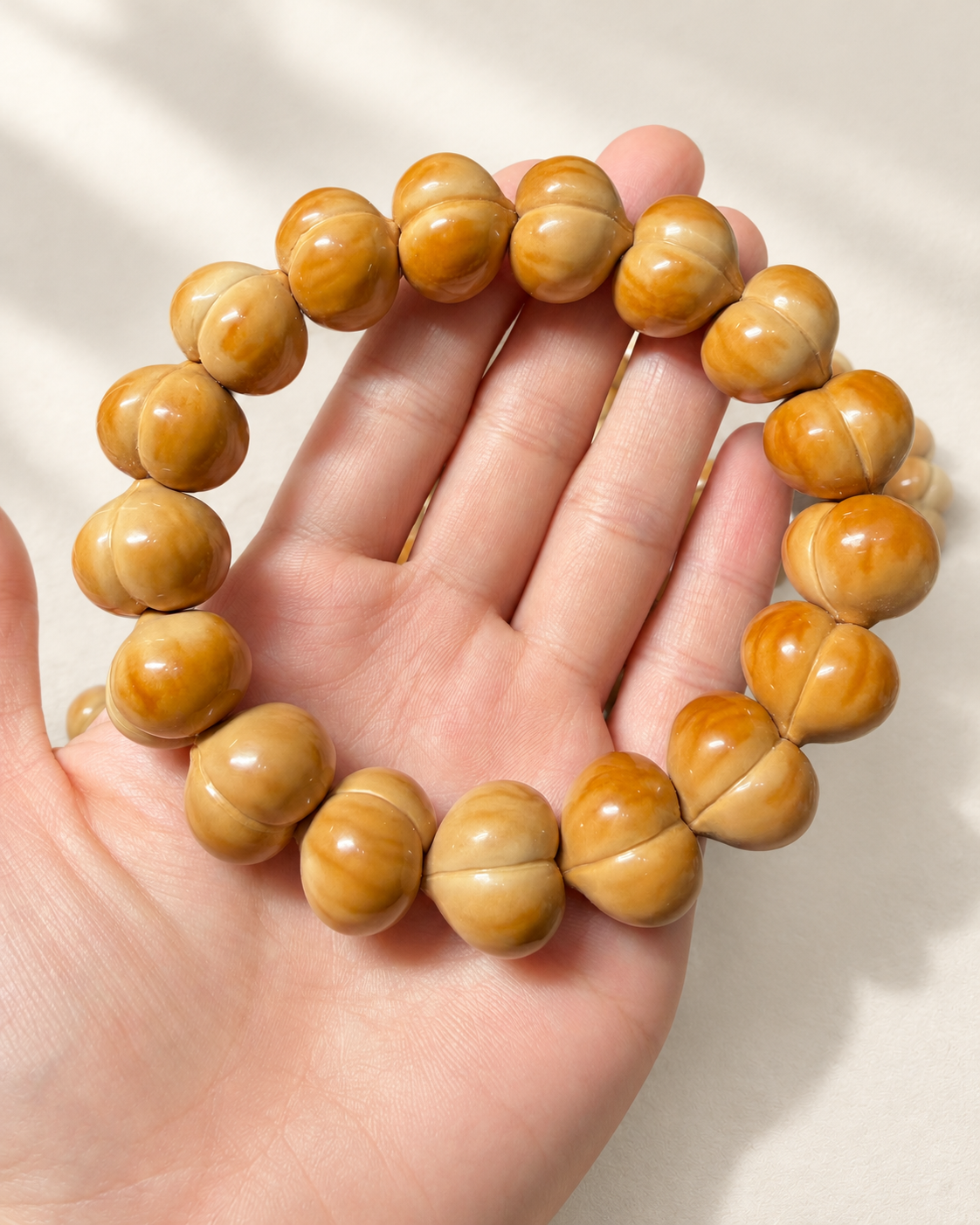 Walnut Bead Bracelet, Polished Peach Forms