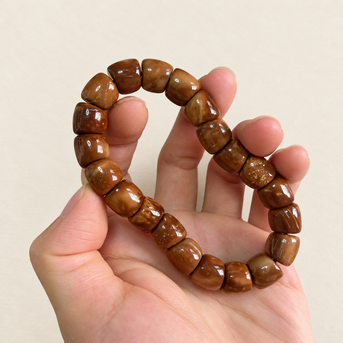 Kuke Bracelet, 11 mm Rounded Barrel Beads — another angle