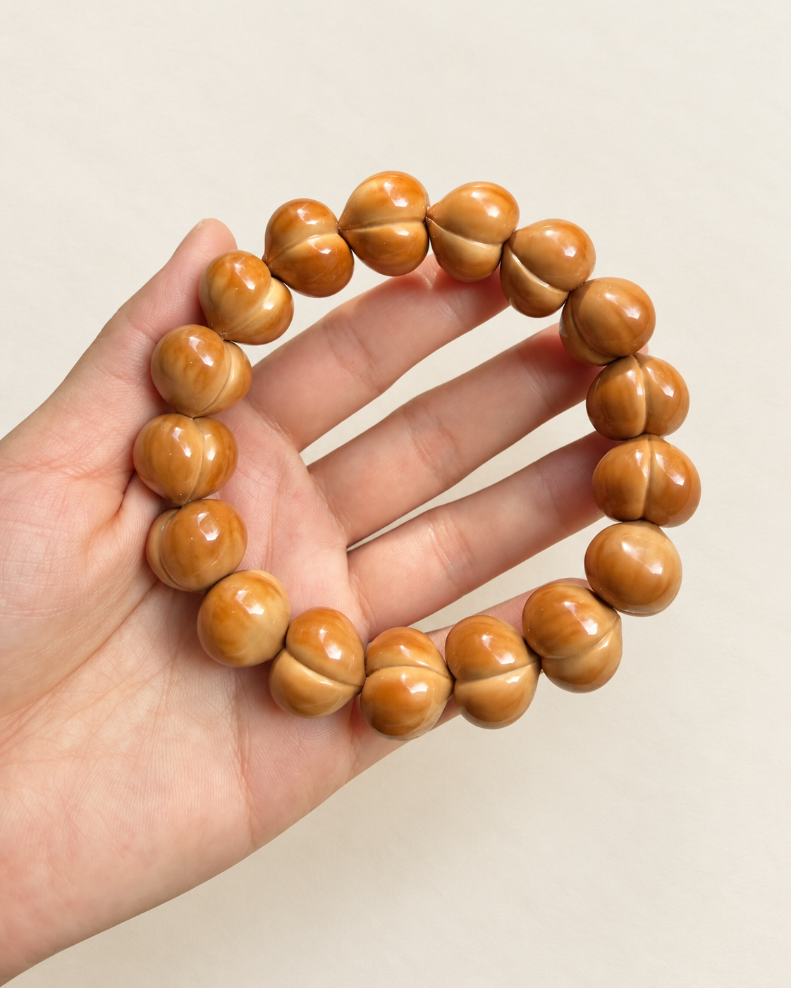 Monkey Head Walnut Bracelet, Glossy Peach Beads — another angle
