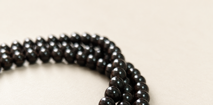 Coconut Calyx Strand, 108 Round Beads — detail view