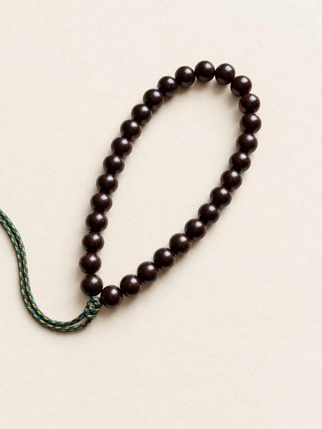 Coconut Calyx Hand Strand, Round Beads — detail view