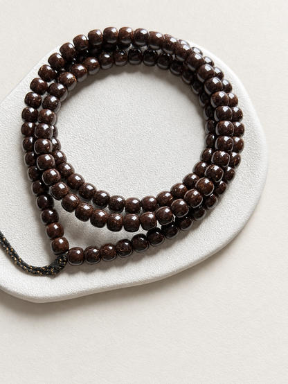 Coconut Calyx Strand, 108 Barrel Beads — another angle