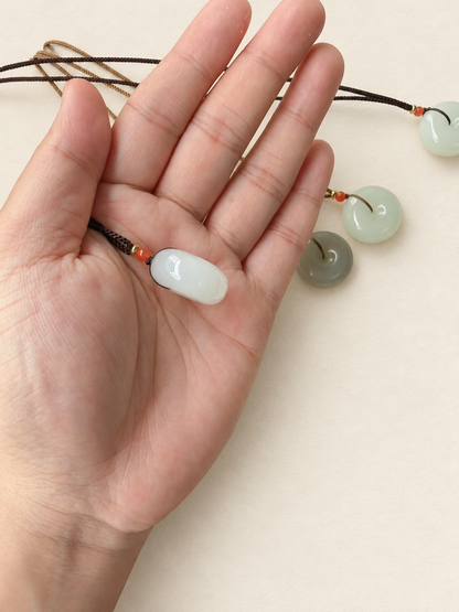 Nephrite Jade Pendant, White Disc — detail view