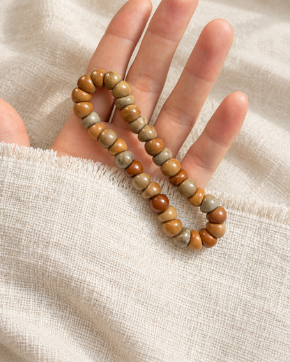 Kuke bracelet resting in the hand